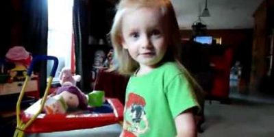 Toddler Watching the Mother Goose Club DVD