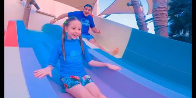 Nastya and dad on water attractions